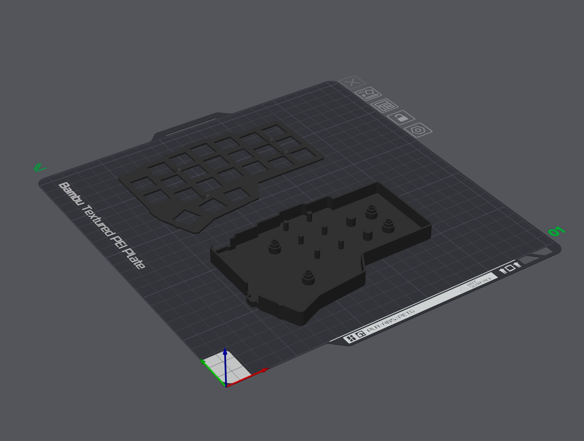 The black Corne enclosure base and switch plate arranged on the build plate in Bambu Studio’s 3D preview